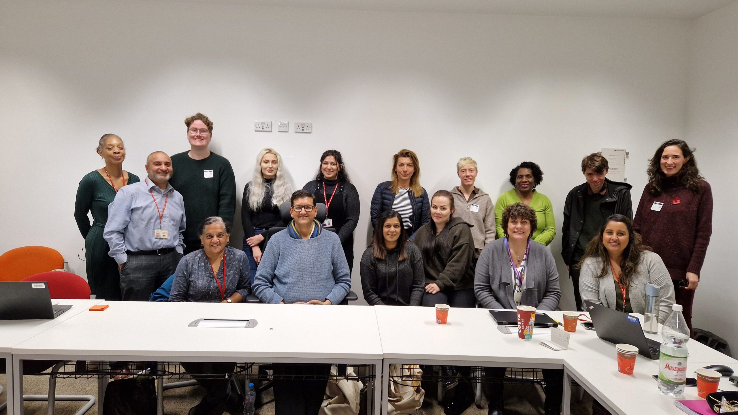 This is a group of diverse people posing for a photo. The group consists of staff from the Child Employment Team, Business Support Team and the Customer Service Programme team who attended the Ideation session at Woodcock Street offices on 7 November 2022.