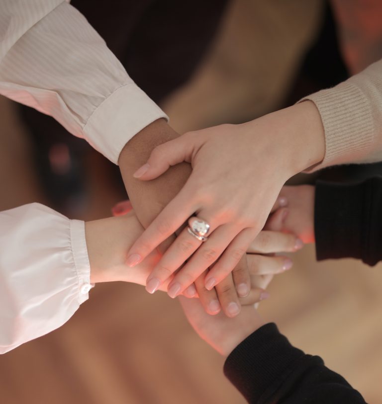 Photo by Andrea Piacquadio: https://www.pexels.com/photo/crop-friends-stacking-hands-together-3830752/